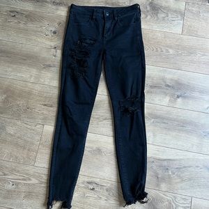 American Eagle Ne(x)t Level Stretch Black ripped jeans
